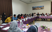 محفل خوشنویسی با حضور هنرمندان و دانش‌آموزان در بافق